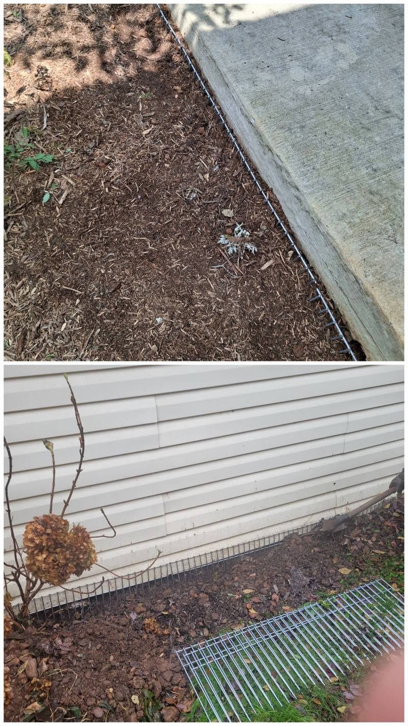 Steel dig barrier set into the ground along a concrete walkway and against house siding